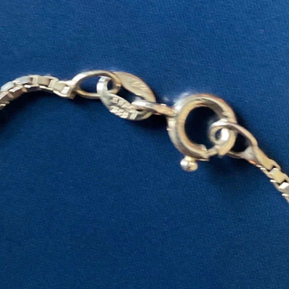 CROSS WITH TAPERED BAGUETTE  CUT CLEAR STONES AND SILVER on a  SILVER CHAIN - Picture 3 of 6